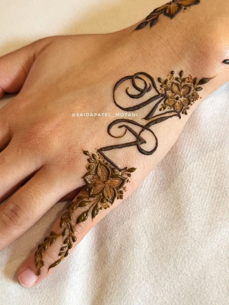 Arabic Simple Finger Mehndi Design with Hidden Name for Engagement (2)