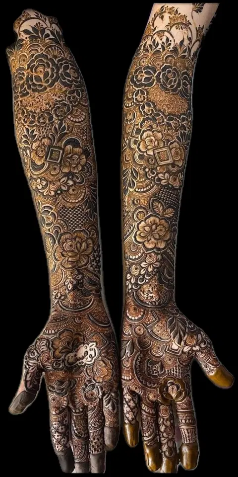 aesthetic bridal figure front hand mehndi design
