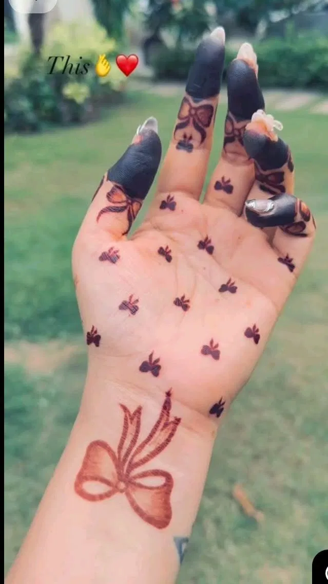 Aesthetic Simple Finger Mehndi Design with Gol Tikki for Engagement (4)