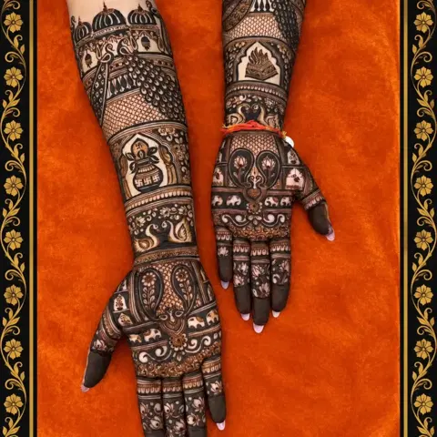 figure full hand mehndi design