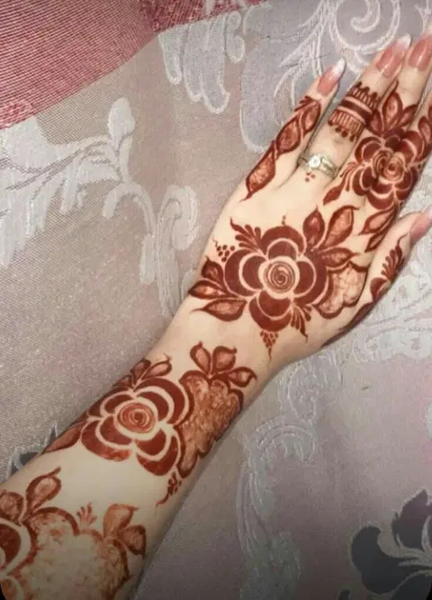 aesthetic arabic flower back hand mehndi design