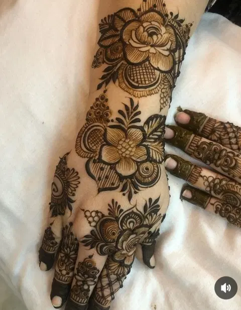 aesthetic arabic flower back hand mehndi design