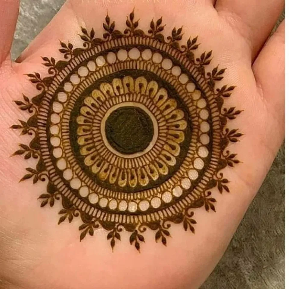 Simple Stylish Front Hand Mehndi Design with Gol Tikki, Lotus and Moon