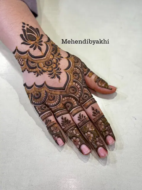 bridal stylish lotus back hand mehndi design