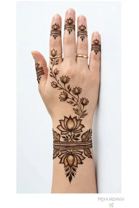bridal simple lotus back hand mehndi design