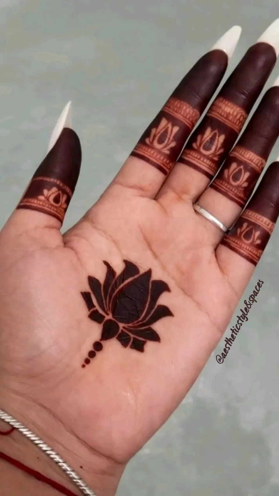 Minimal Simple Back Hand Mehndi Design with Flowers, Lotus and Peacock for Sawan