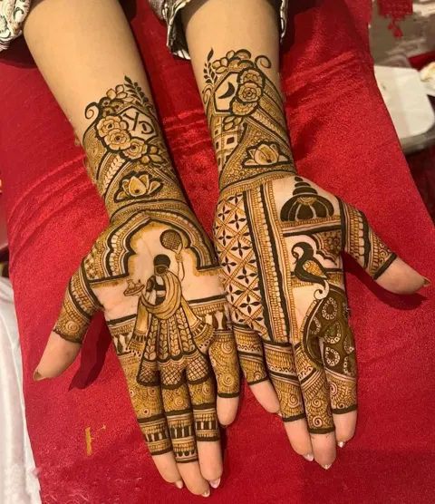 bridal stylish figure back hand mehndi design