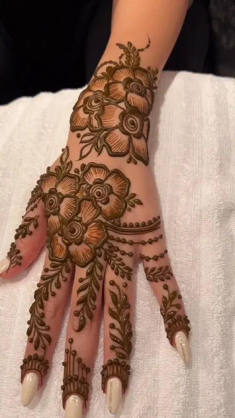 aesthetic arabic flower back hand mehndi design