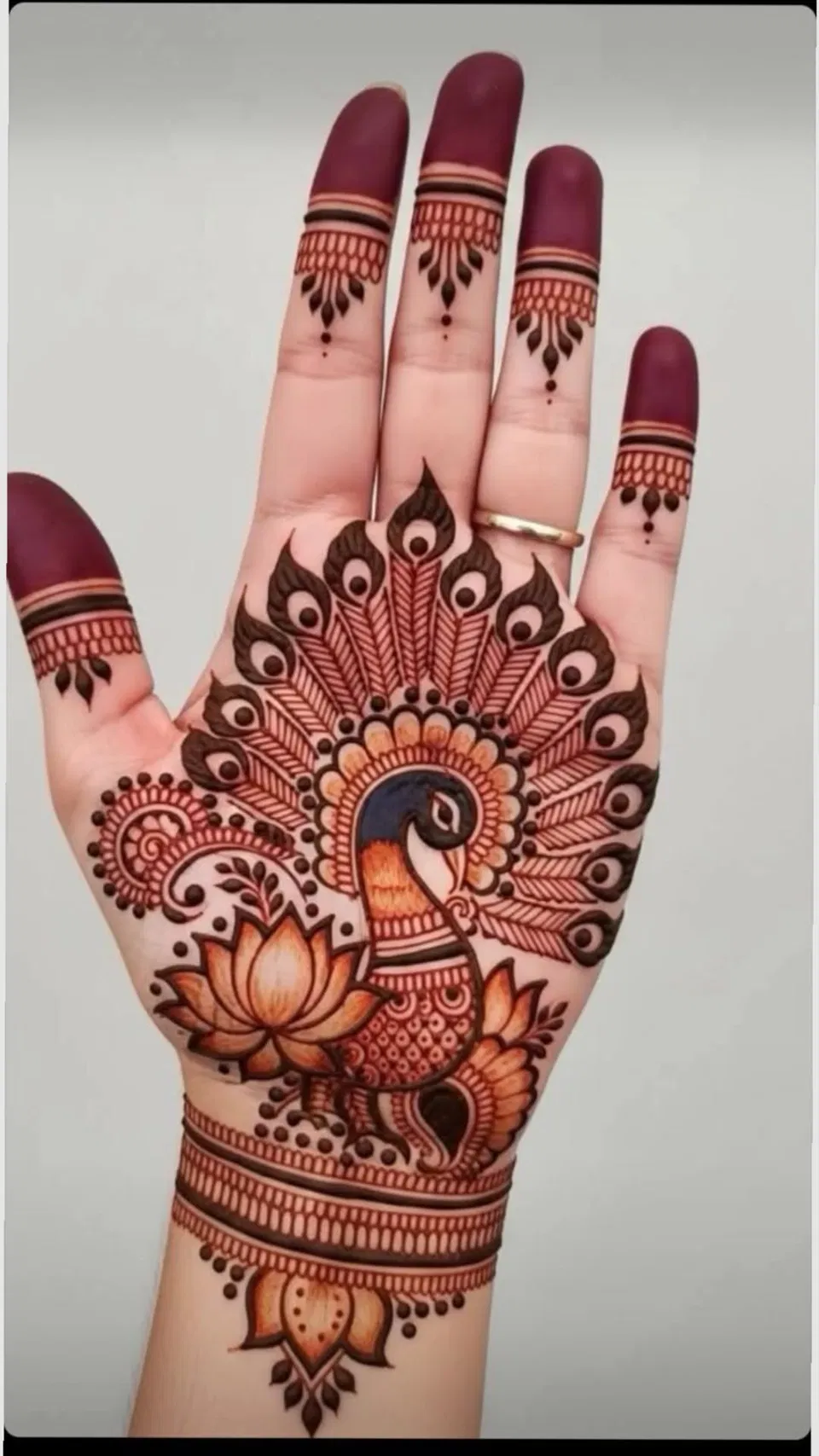 Bridal Simple Front Hand Mehndi Design with Gol Tikki and Peacock