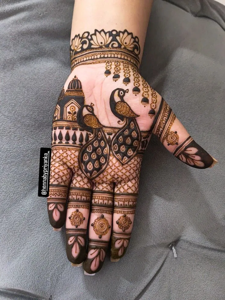 Stylish Front Hand Mehndi Design with Deity and Peacock (3)