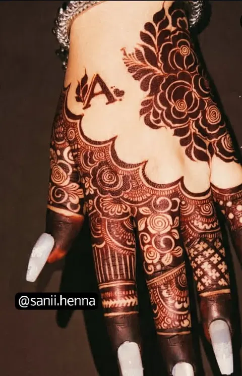 aesthetic arabic flower back hand mehndi design