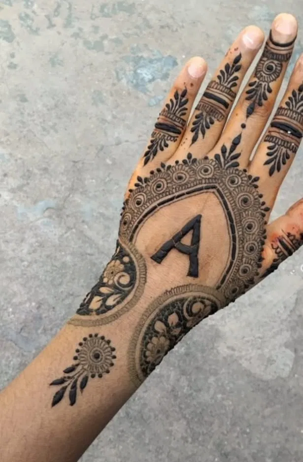 Simple Back Hand Mehndi Design with Hidden Name (2)