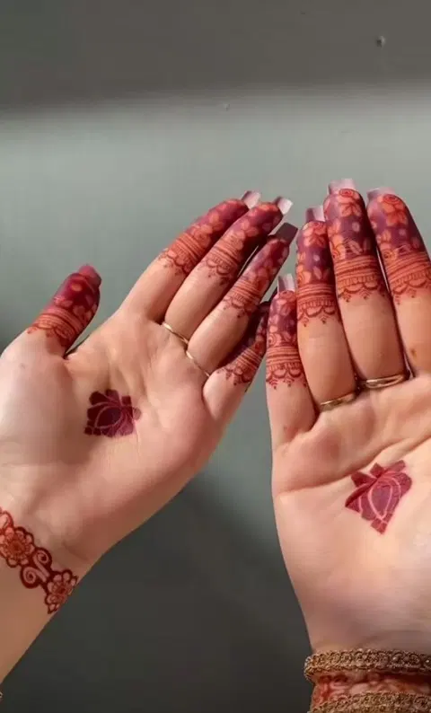 aesthetic simple lotus back hand mehndi design