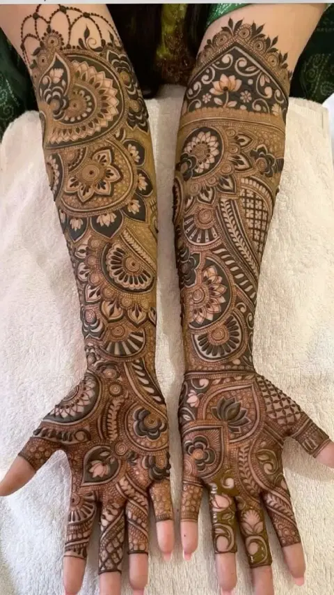 bridal indian figure arm mehndi design