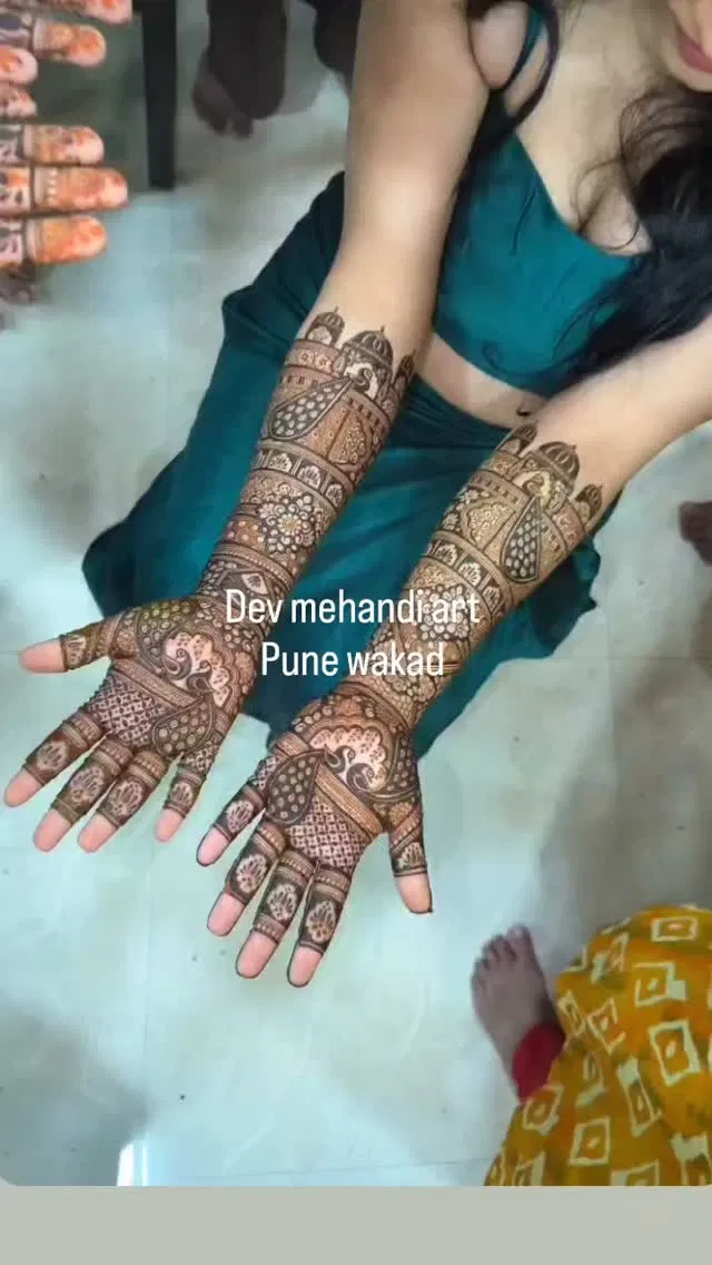 Front Hand Mehndi Design with Figures, Hearts and Peacock