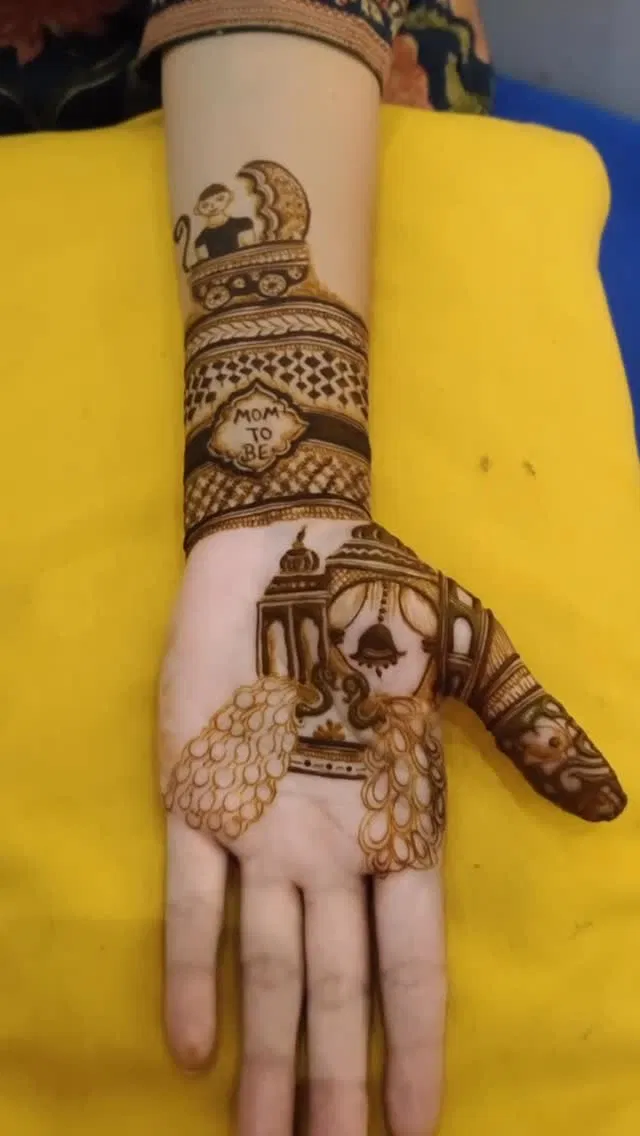 Front Hand Mehndi Design with Peacock