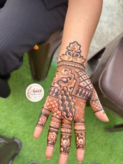 simple peacock back hand mehndi design