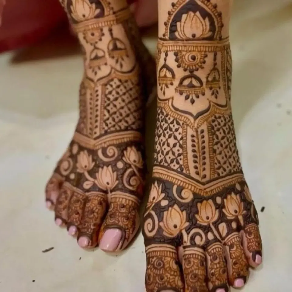 Foot Mehndi Design with Figures and Lotus