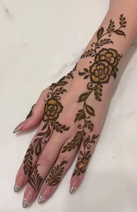 aesthetic arabic bel arm mehndi design