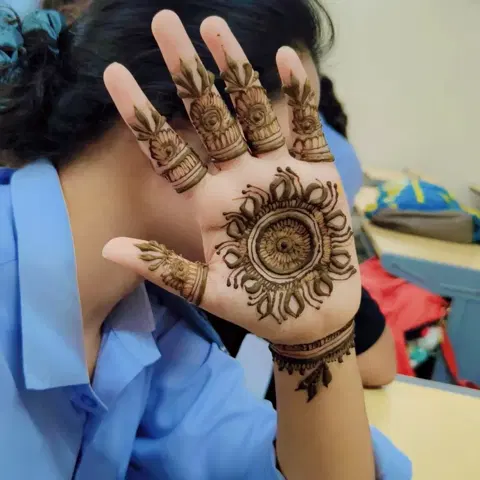 simple circle full hand mehndi design