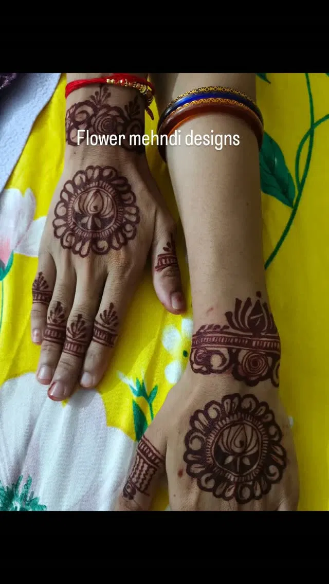 Simple Back Hand Mehndi Design with Flowers