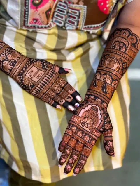 bridal figure back hand mehndi design