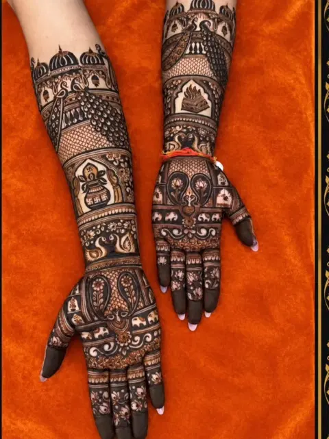 figure full hand mehndi design