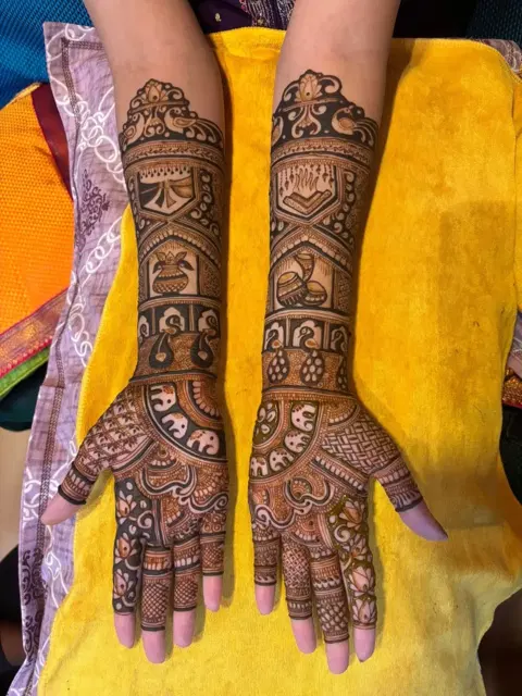 figure full hand mehndi design