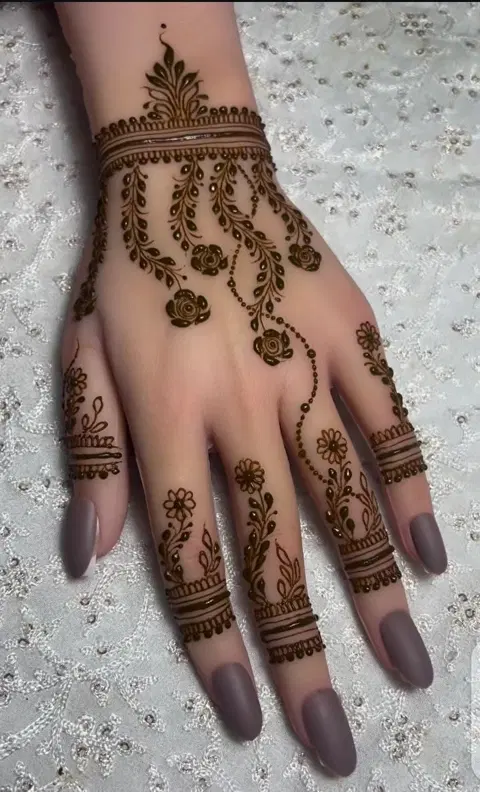aesthetic arabic flower back hand mehndi design