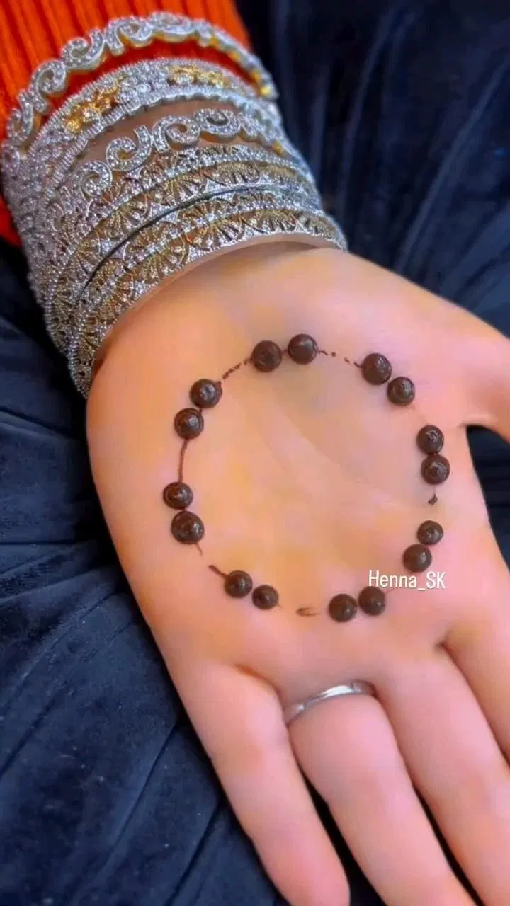 Simple Back Hand Mehndi Design with Gol Tikki