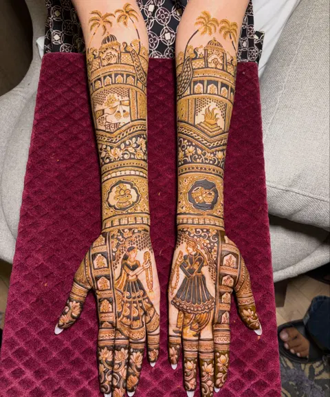 figure back hand mehndi design