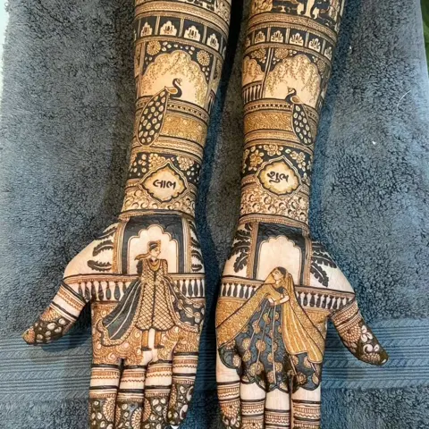 figure full hand mehndi design