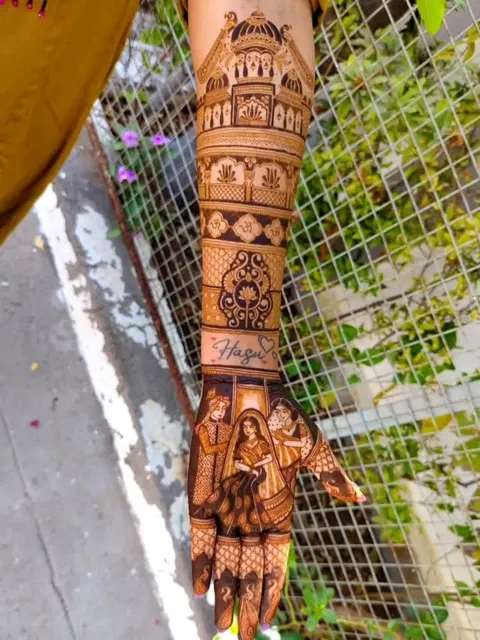 figure full hand mehndi design