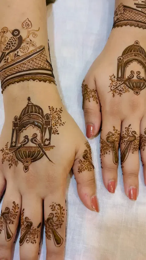 peacock back hand mehndi design