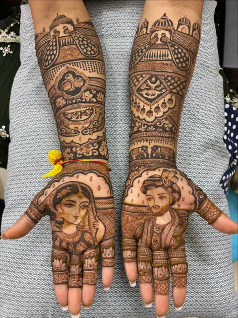 bridal figure front hand mehndi design