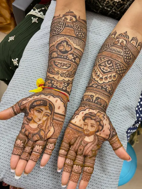 bridal figure front hand mehndi design