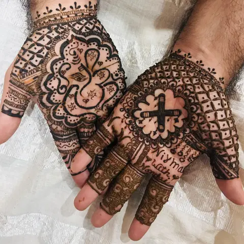 figure full hand mehndi design