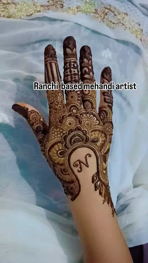 back hand mehndi design