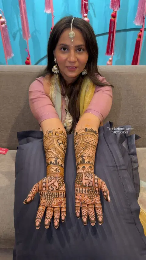 figure front hand mehndi design