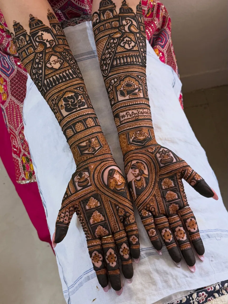 Bridal Back Hand Mehndi Design with Figures, Hearts and Jaal (3)