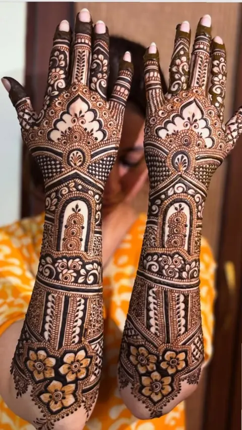 aesthetic bridal figure arm mehndi design