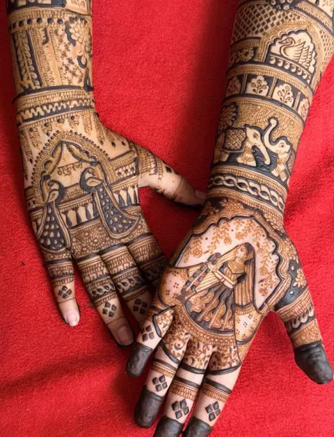 bridal figure front hand mehndi design