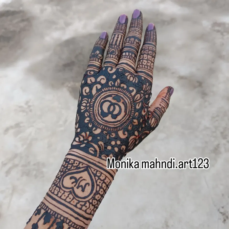 Arabic Bridal Back Hand Mehndi Design with Gol Tikki