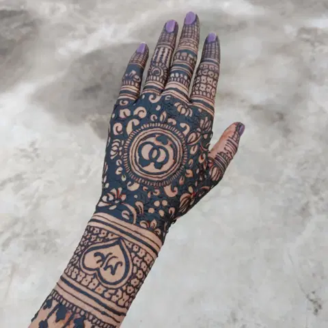 bridal back hand mehndi design