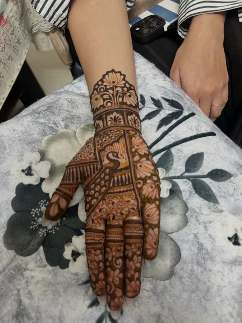 peacock front hand mehndi design