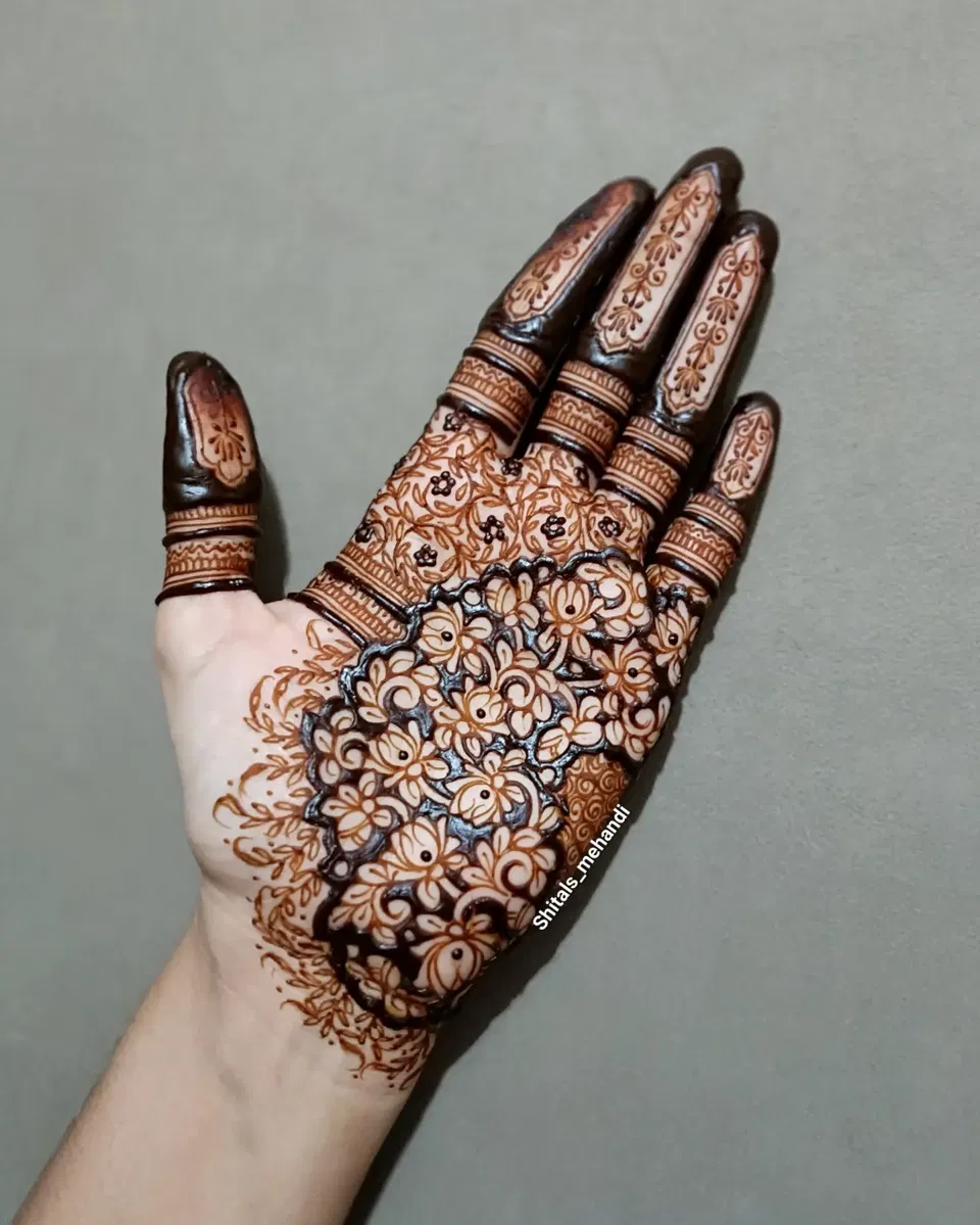 Bridal Back Hand Mehndi Design with Gol Tikki