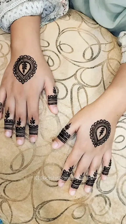 minimal simple heart back hand mehndi design