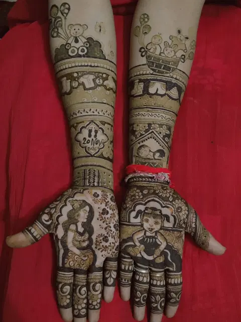 figure full hand mehndi design