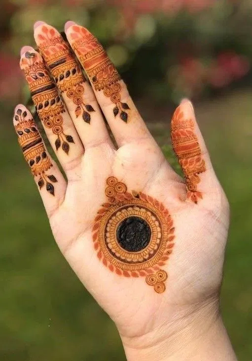 Simple Stylish Front Hand Mehndi Design with Gol Tikki and Deity