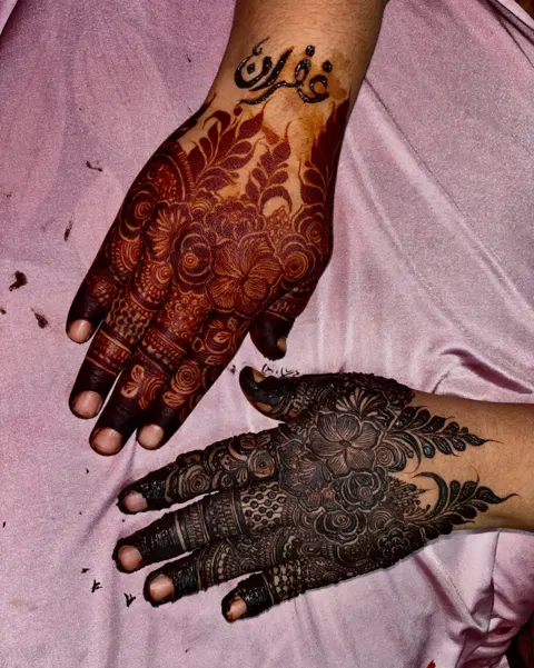 back hand mehndi design
